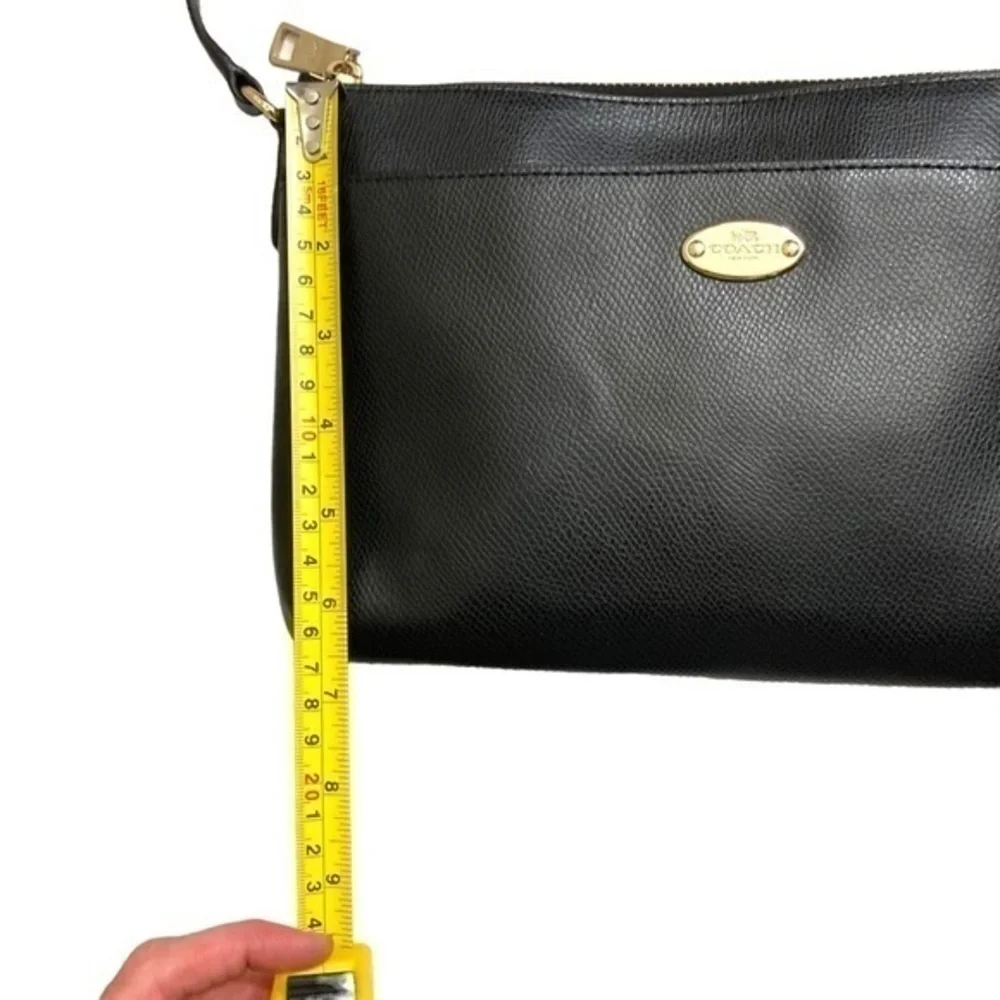 Coach black grained leather file crossbody bag